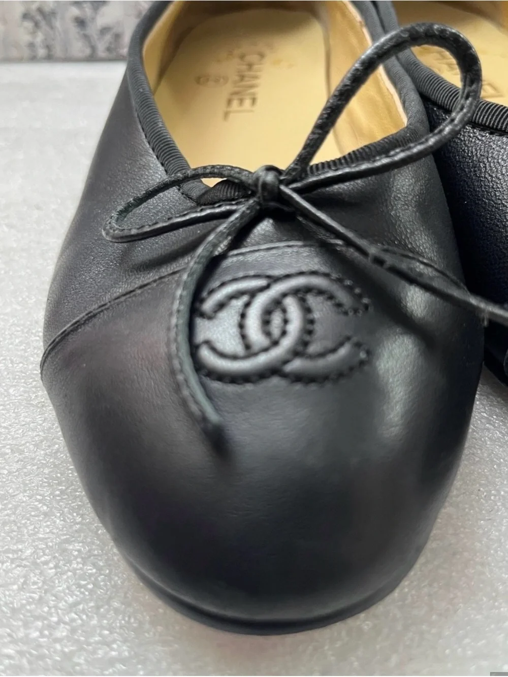 CHANEL Black Leather Ballet Flats with Bow and CC Motif